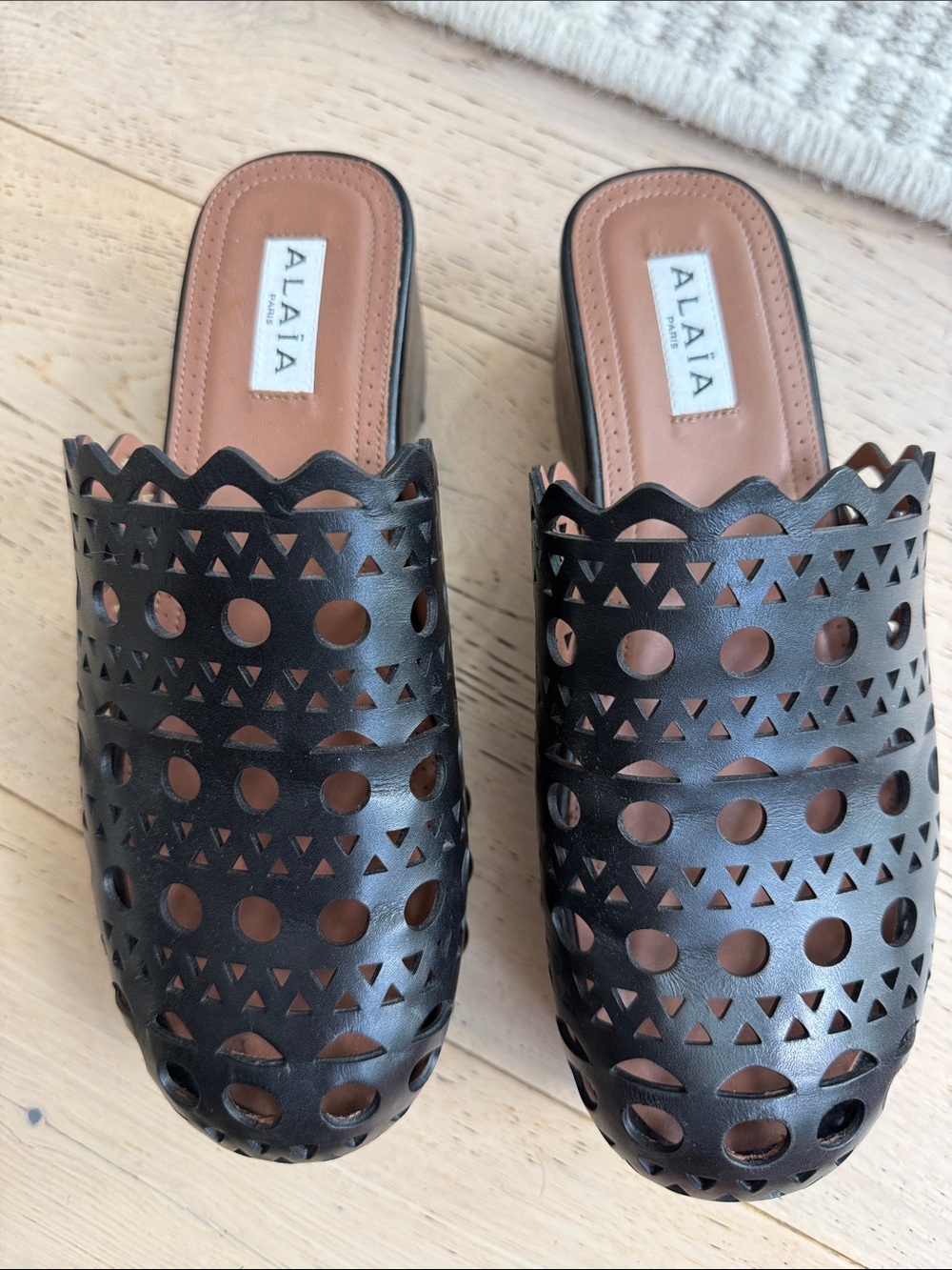Alaïa Black Laser-Cut Leather Clogs